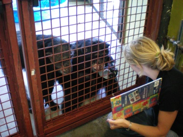 Jamie and Burrito looking at photo album