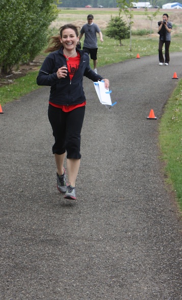 web laura crossing finish line IMG_4155 Laura running to the finish