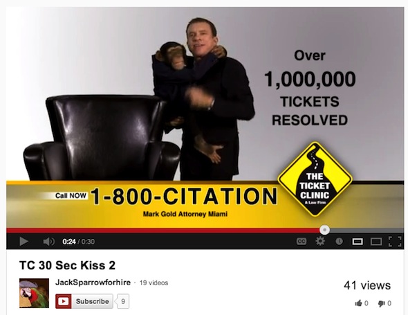 Screenshot of The Ticket Clinic's TV spot featuring a baby chimpanzee