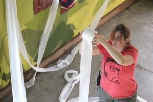 Debbie concentrating on toilet paper